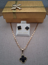 cadena dije y aretes flor