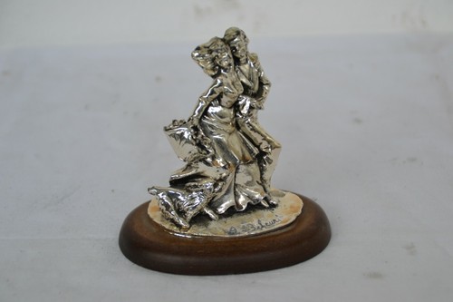 Vecchia statuina materiale - statuina,