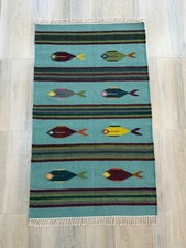 Tappeto zona lana intrecciata