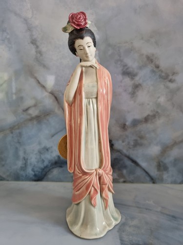 Statuina porcellana cinese