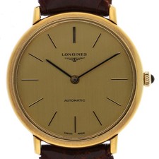 LONGINES round gold Dial