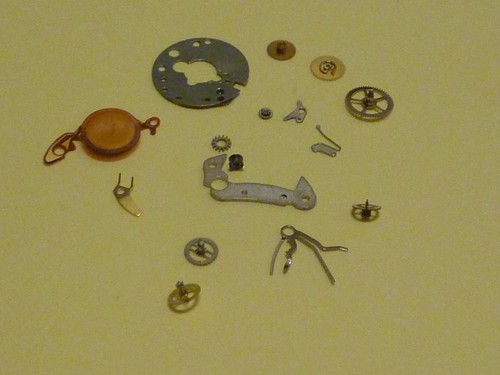 Lot pieces mouvement cartier - lot,