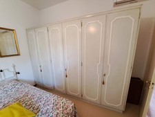 Armadio a sei ante in legno laccato degli anni '60