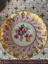 piatto porcellana di Limoges con decori floreali e bordo dorato. Diametro cm. 20