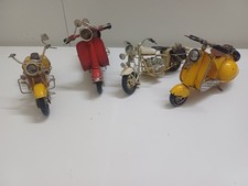 4 vespe collezione in latta