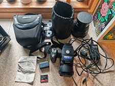 Fotocamera Sony Cyber-shot DSC-R1, più obiettivo di conversione VCL-DEH17R 1.7 e adattatore