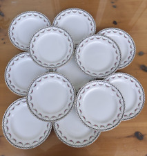 Antico servizio 12 piattini da