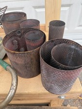 Fodere per stufa in metallo traforato vintage