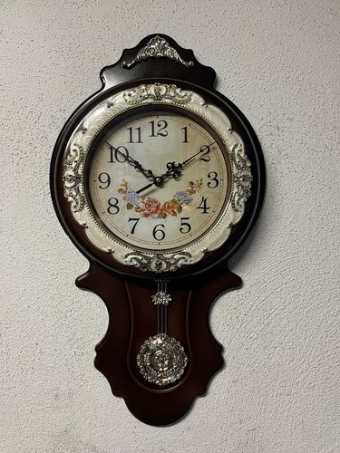 Orologio pendolo a - a,