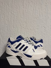 JS3260 Adidas Midcity Low -