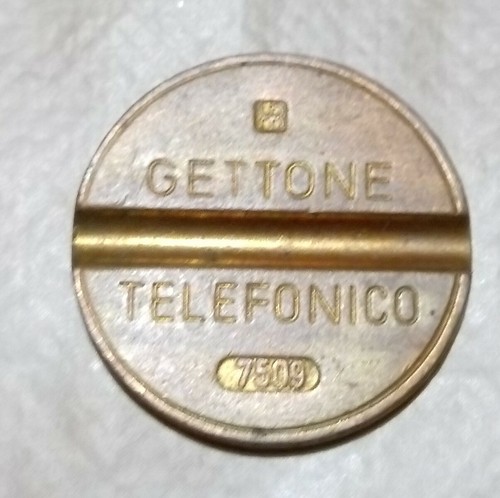 Gettone telefonico con segno - gettone,