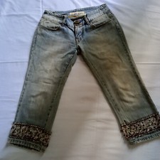 jeans donna vita bassa stone washed fondo gambe con perline