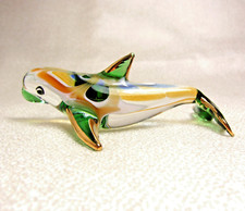 Statuina delfino verde ambra