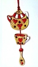 Teiera tazza e cucchiaino