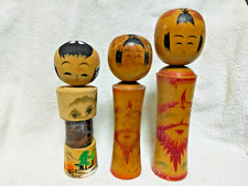 Bambole giapponesi in legno