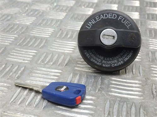 Lockable fuel cap with - cap, key-