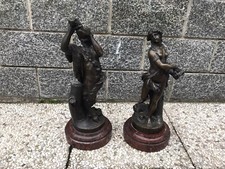 coppia di sculture in bronzo