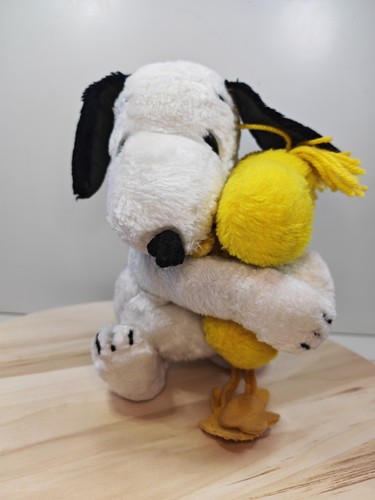 Vintage snoopy hugging - snoopy,