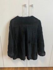 Pelliccia donna nera corta in