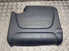 Assetto coprimotore superiore