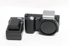 Corpo fotocamera mirrorless Sony Alpha NEX-5 14,2MP con flash Sony HVL-F7S