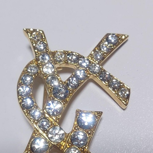 Spilla yves saint laurent - yves,