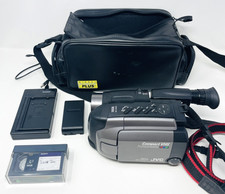 Videocamera JVC GR-AXM70 VHS-C compatta funzionante con borsa carica batteria fotocamera