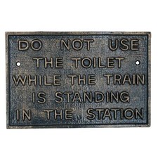 Targa insegna in ghisa per WC
