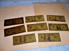 COLLEZIONISMO 8 BANCONOTE DOLLARI AMERICANI in LAMINATO PLASTICO DORATO AFFARE!