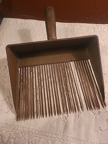 Antico rastrello paletta