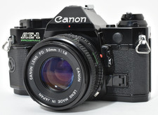 ▶️ Fotocamera Canon AE-1 PROGRAM pellicola nera quasi come nuova NFD 50mm f/1...