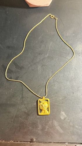 Collana con ciondolo busto