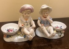 Coppia di antiche statuine