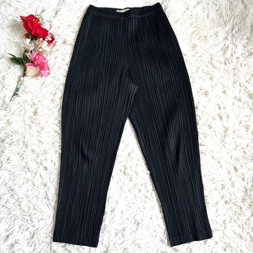 Pantaloni plissettati conici