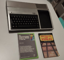 Texas Instruments TI-99/4A + 2 books, no cables,  not tested