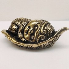 Antica statuina scimmia ottone