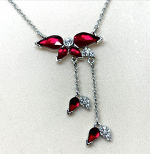 COLLANA ORIGINALE SWAROVSKI CON PENDENTE IN CRISTALLI E NAPPINE ROSSE