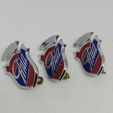 Lotto di 3 fregi da mascherina Ghia smalti rossi e blu integri