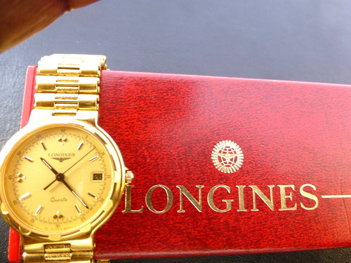 Longines conquest quartz gold - conquest,