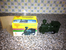LOCOMOTIVA IN PLASTICA A MOLLA