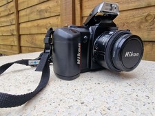 Nikon F401 fotocamera fotografica + obiettivo Nikkor 50 mm 1:1.8 con filtro lucernario Hoya 52 mm