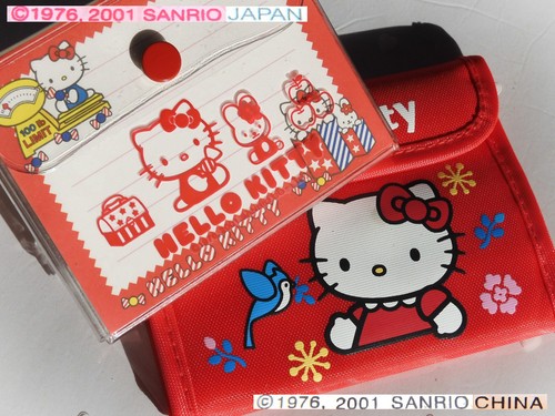 Sanrio hello kitty - 👛,