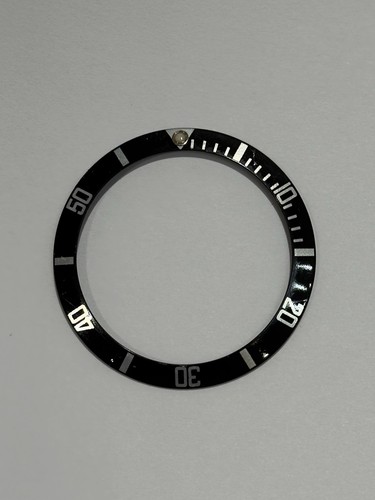 Rolex 16610 ghost bezel