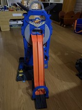 Hot Wheels GWT34- Mega Garage con Pista a 2 Corsie Playset, Fino a 35 Macchinine