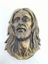 testa in bronzo Caggiati targa