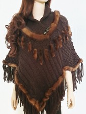 Poncho in maglia con vera