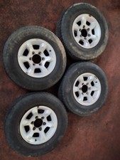 SsangYong N.4 CERCHI LEGA+GOMME 6 FORI 15" 7JJ 15 ET22 - 235 75 R15 105T ESTIVE