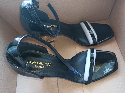 Yves saint laurent - saint, con