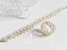 Set di bracciale ed anello intrecciati con perline Argento e avorio