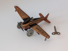 Antico aereo giocattolo in